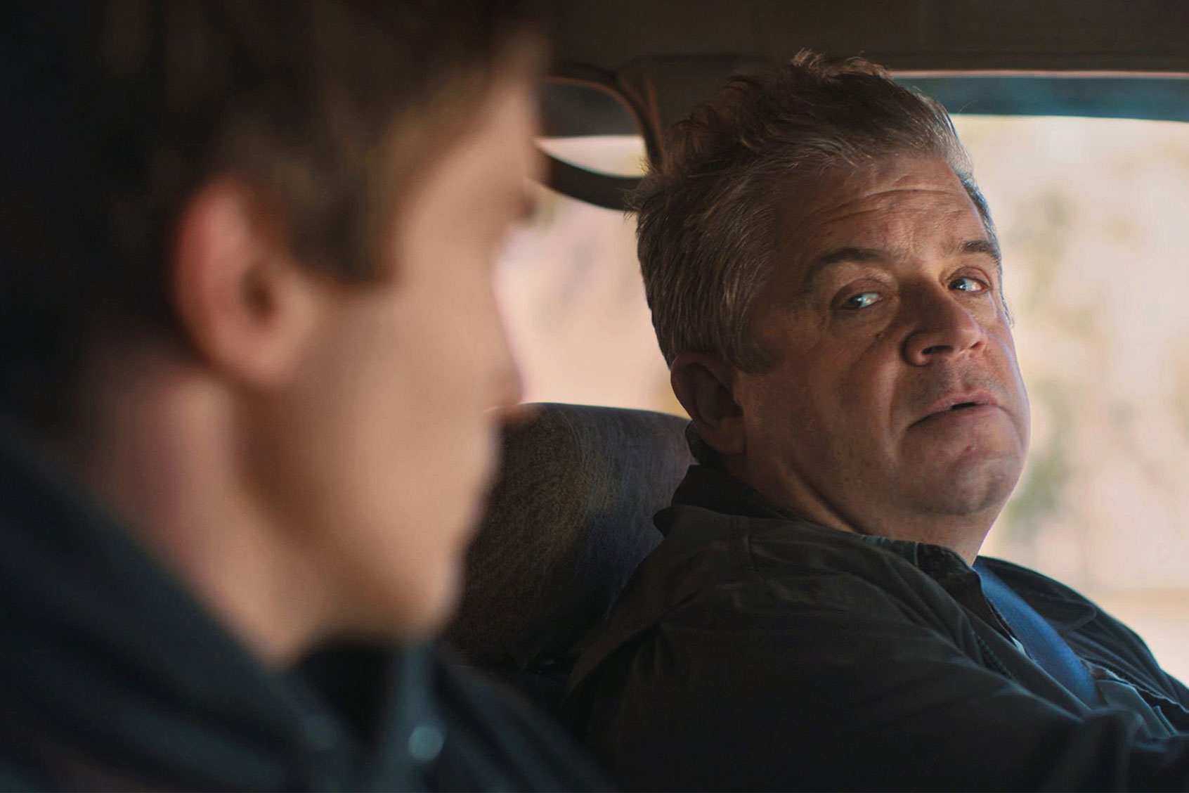 Patton Oswalt talks lying, comic books and catfishing in his new cringe comedy “I Love My Dad”