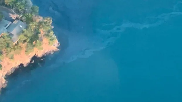 Crews prepare to raise sunken fishing vessel leaking oil into Salish Sea