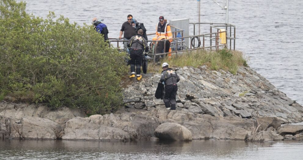 Son tried to rescue father and brother, inquest hears