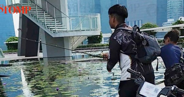 Youths seen fishing at MBS, escaped security with ‘5 to 8 large goldfishes’, Singapore