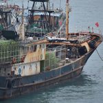 China urges Australia to help find crew of capsized fishing boat