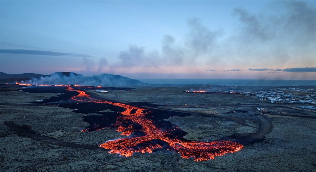 News24 | WATCH | Lava spews into fishing town after volcano erupts in Iceland